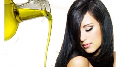 তেল দিলে কি চুল পড়া কমে?